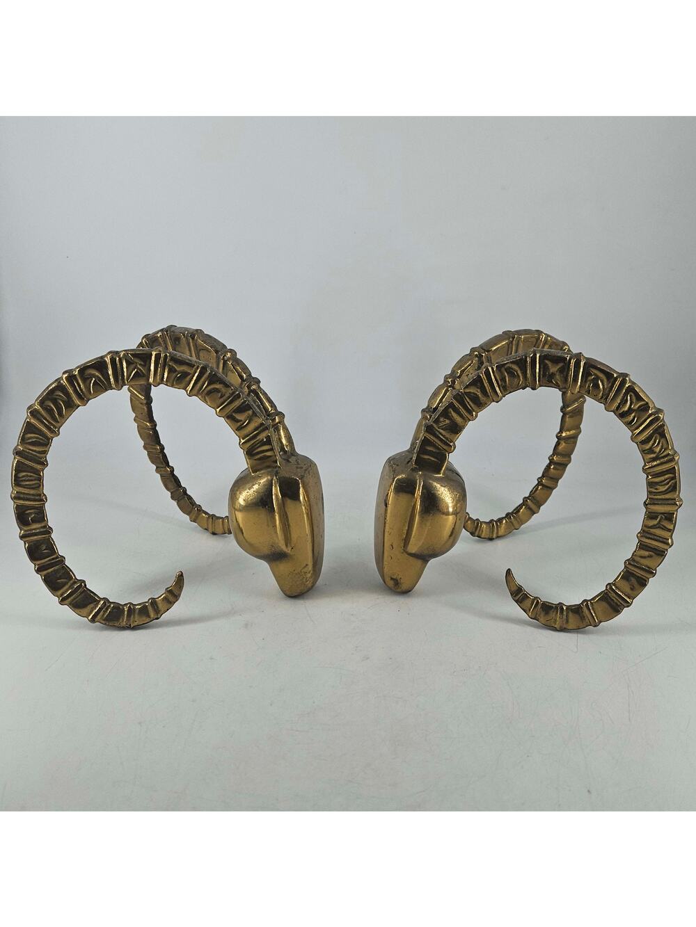 Vintage pair of Dolbi Cashier solid Brass Rams Head Bookends art deco